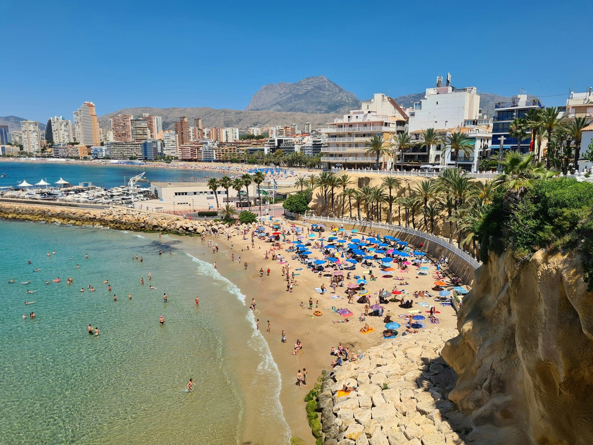 A Spanish seaside town with its beach and promenade